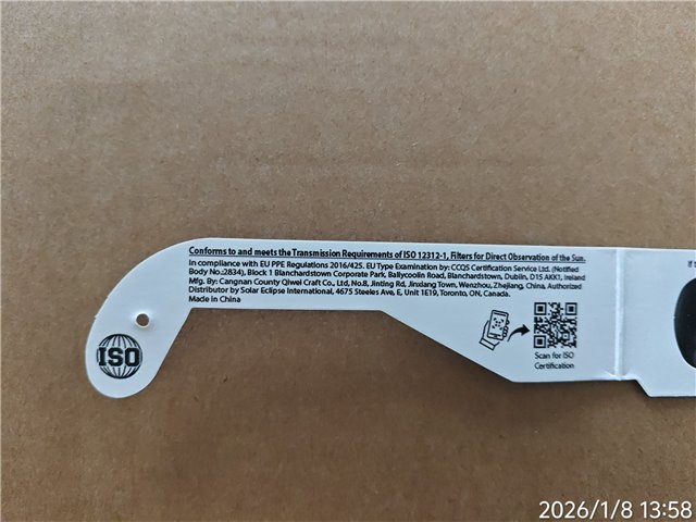 Glasses arm text showing ISO 12312-1 — affected typo